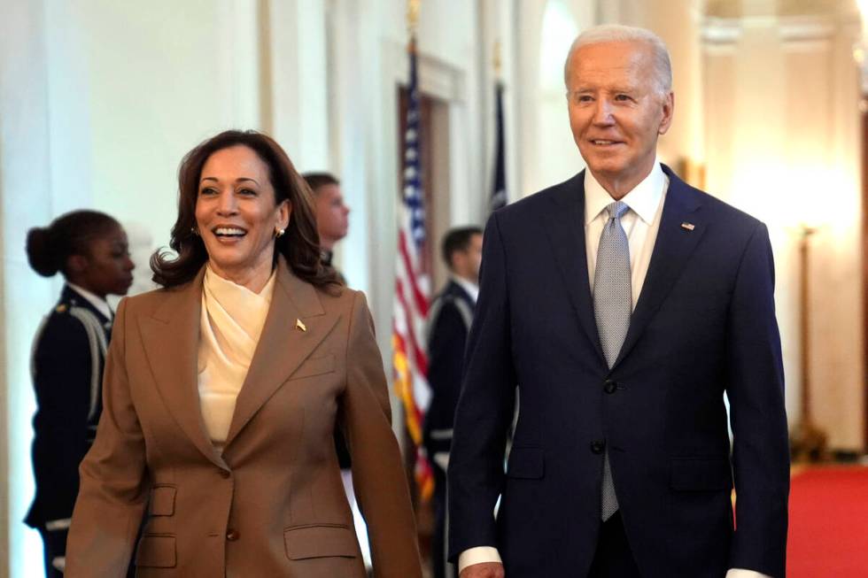 FILE - Vice President Kamala Harris, left, and President Joe Biden arrive for an event in the E ...