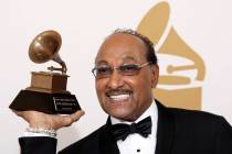 FILE - Duke Fakir holds his life time achievement award backstage at the 51st Annual Grammy Awa ...