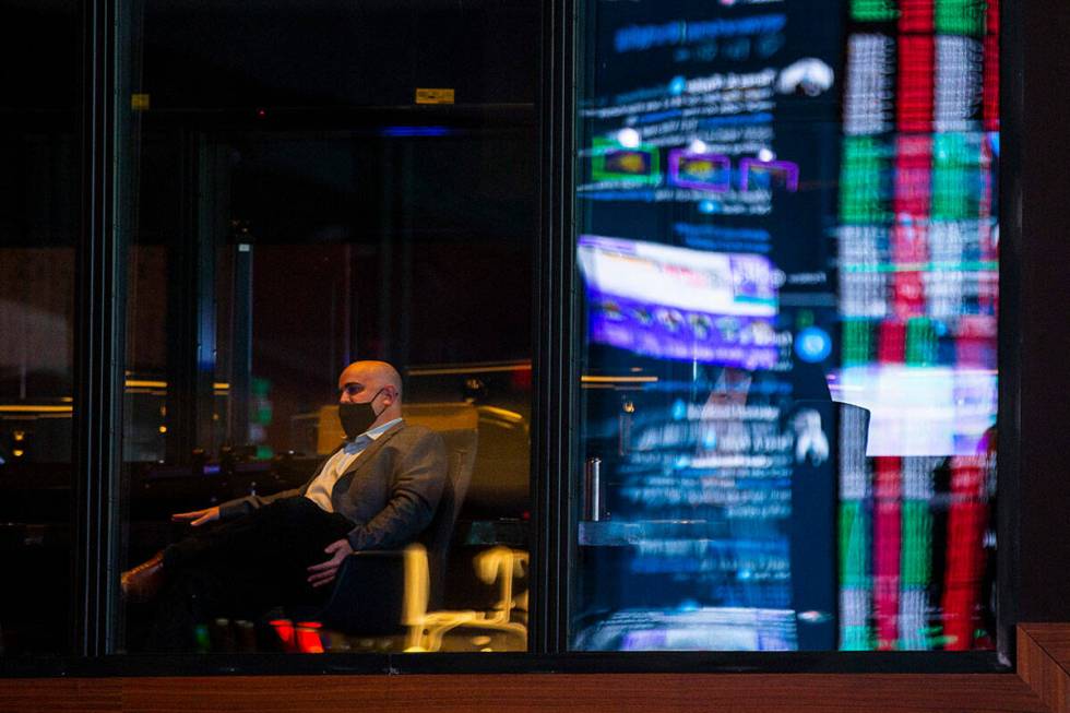 Brian Musburger, of VSiN, is seen through a window near the Circa Sportsbook during a tour of C ...