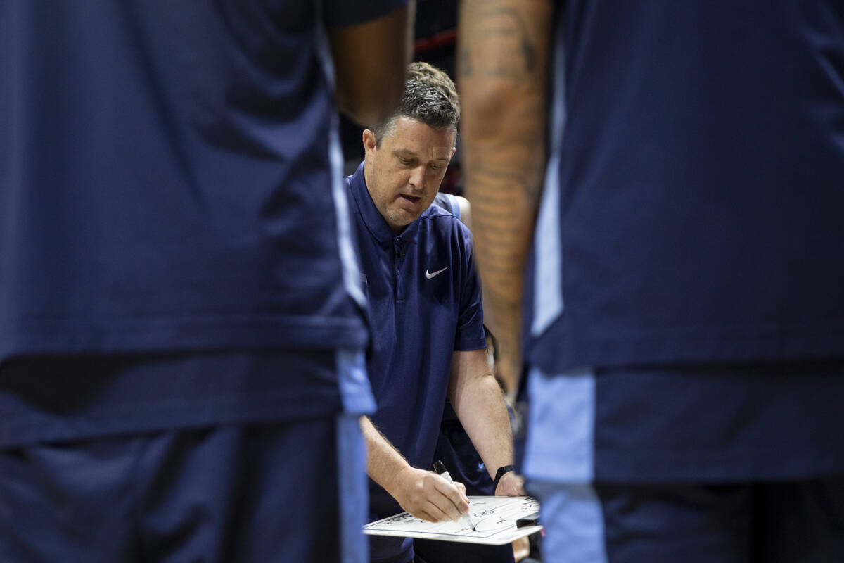 Memphis Grizzlies Head Coach Jason March draws a play during the NBA Summer League Championship ...