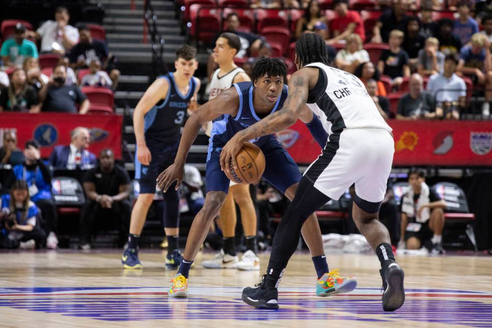 Memphis Grizzlies forward GG Jackson II (45) watches Miami Heat guard Josh Christopher (53) dur ...