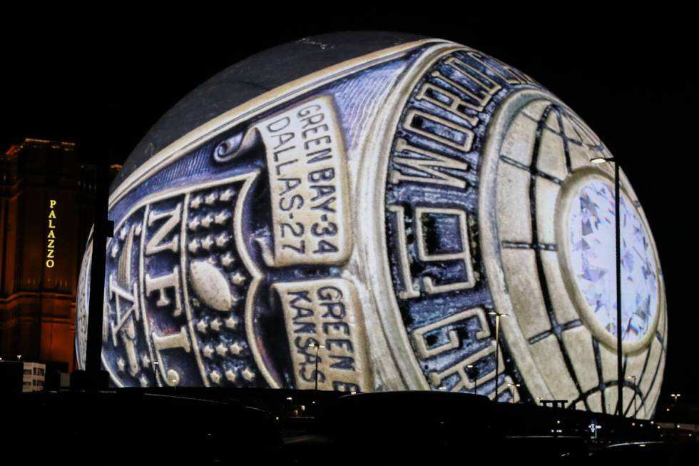 The first Super Bowl ring, awarded to the Green Bay Packers, is shown on the Exosphere. (Daniel ...