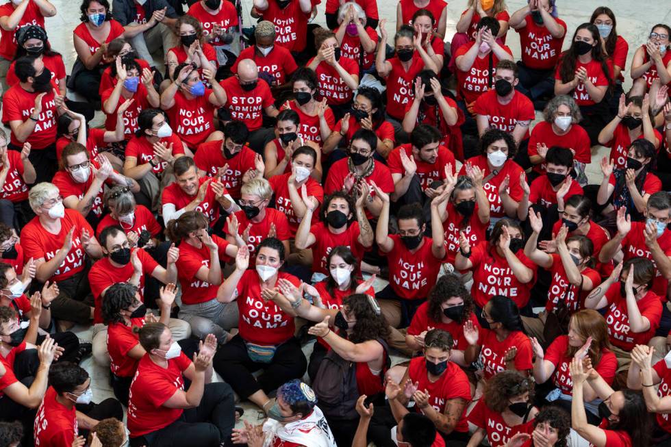 Demonstrators protest against the military policies of Israel a day before a visit by Israeli P ...