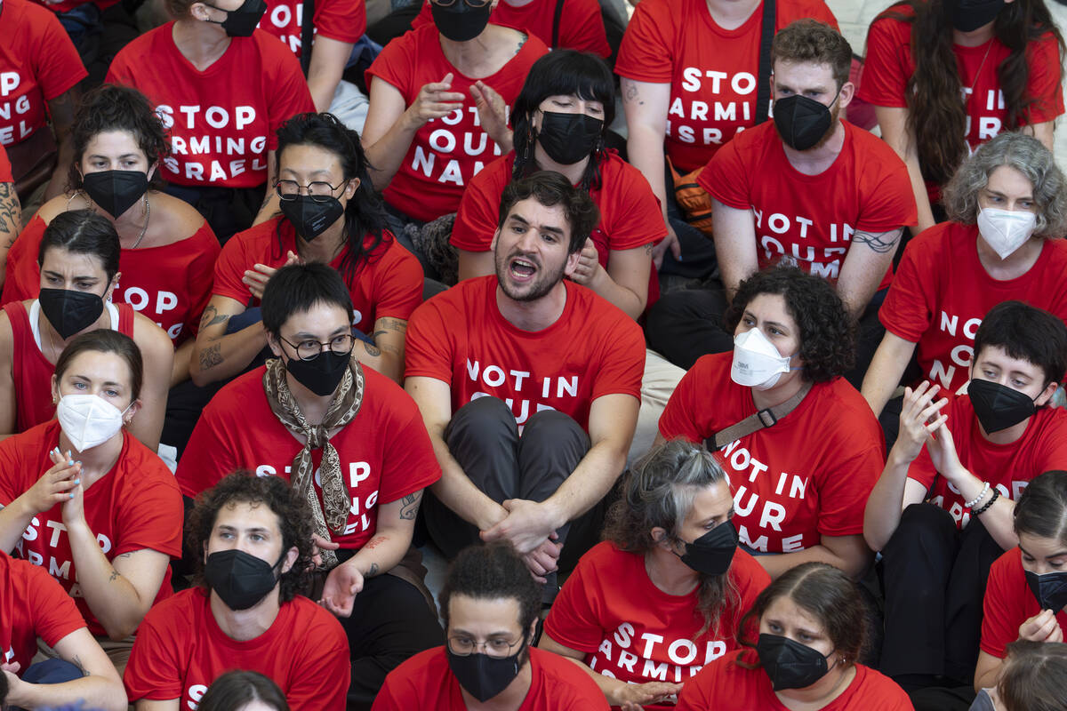 Demonstrators protest against the military policies of Israel a day before a visit by Israeli P ...