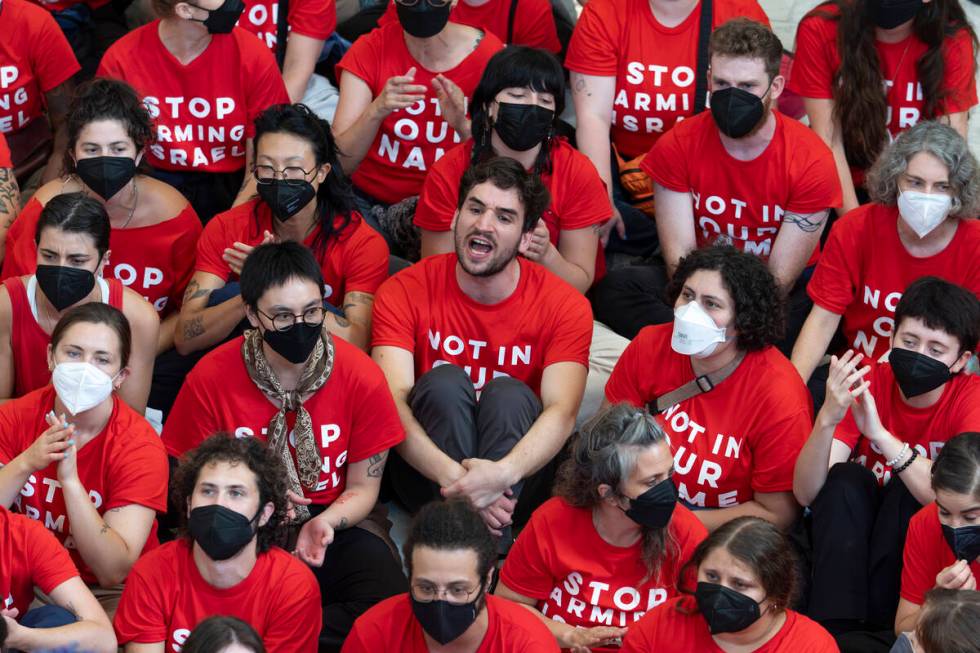 Demonstrators protest against the military policies of Israel a day before a visit by Israeli P ...