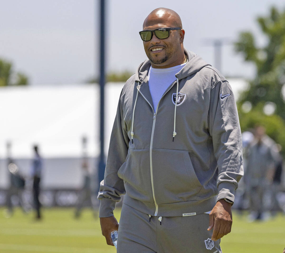 Raiders head coach Antonio Pierce walks the field as he arrives for a news conference at the Ja ...