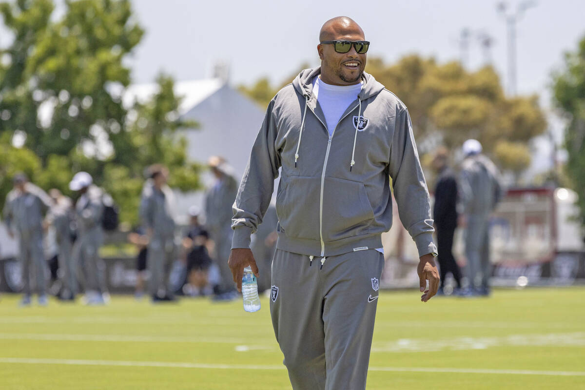 Raiders head coach Antonio Pierce walks the field as he arrives for a news conference at the Ja ...