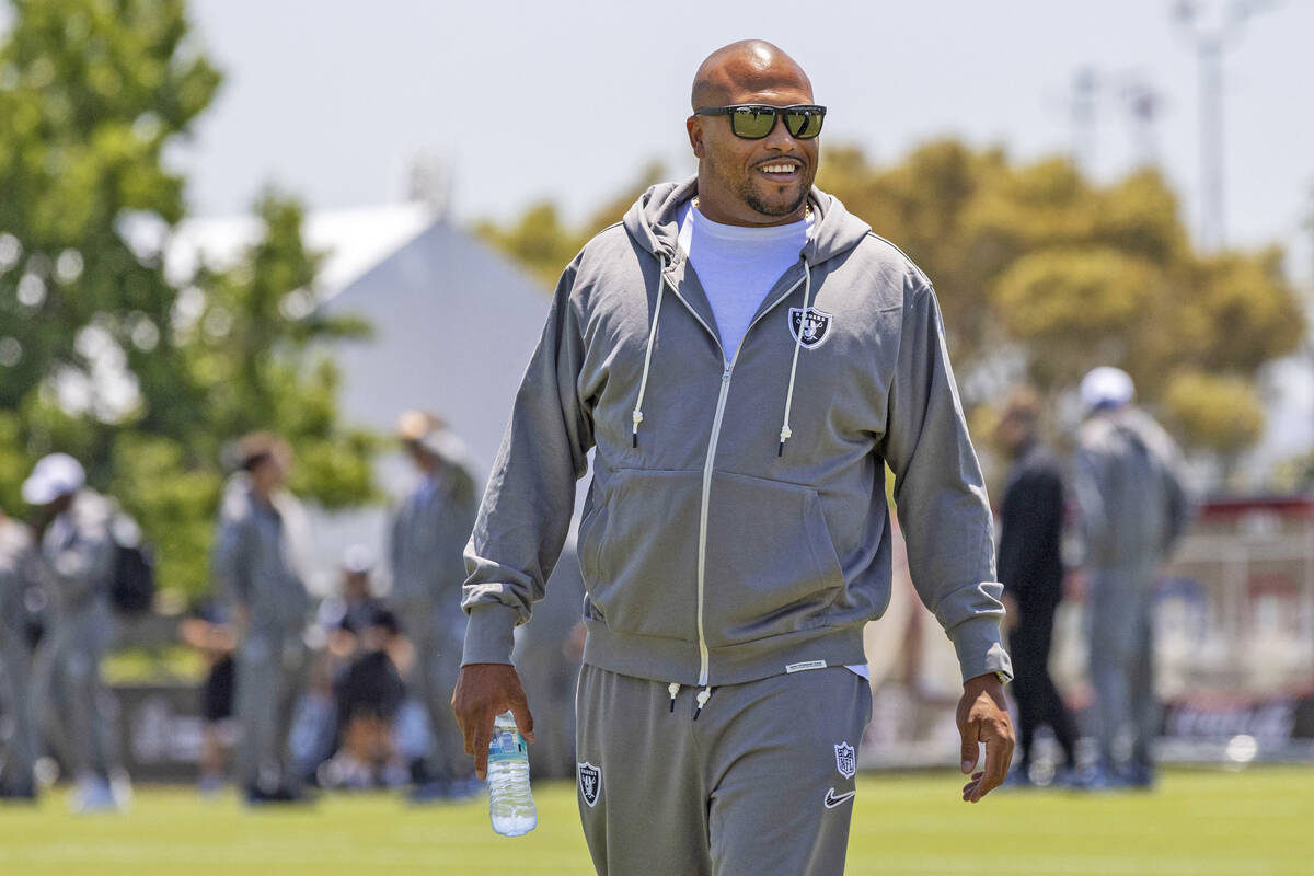Raiders head coach Antonio Pierce walks the field as he arrives for a news conference at the Ja ...