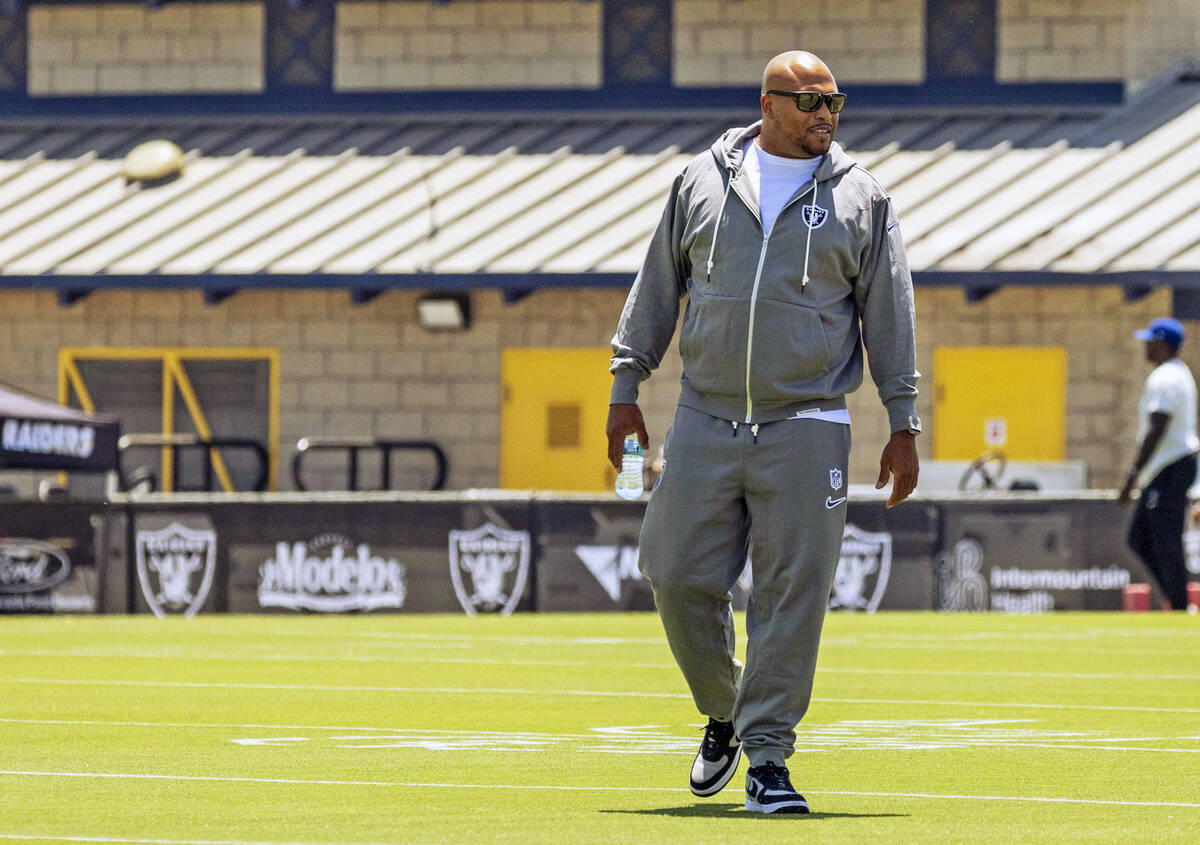 Raiders head coach Antonio Pierce walks the field as he arrives for a news conference at the Ja ...