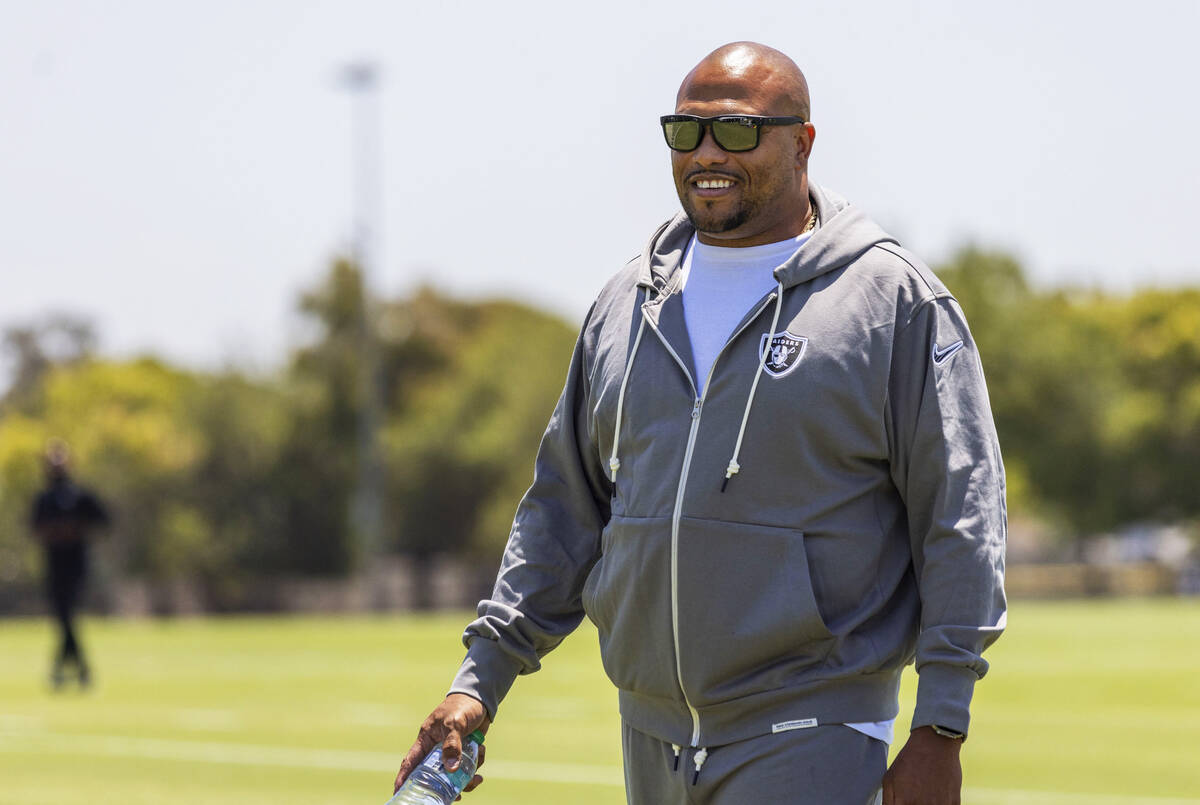 Raiders head coach Antonio Pierce walks the field as he arrives for a news conference at the Ja ...