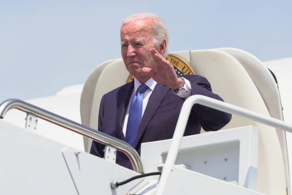 President Joe Biden disembarks Air Force One as he arrives Andrews Air Force Base, Md., Tuesday ...