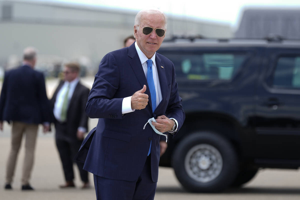 President Joe Biden arrives to board Air Force One at Dover Air Force Base, in Dover, Del., Tue ...