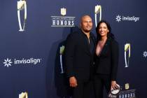 Las Vegas Raiders head coach Antonio Pierce and his wife Jocelyn Pierce walk on the red carpet ...