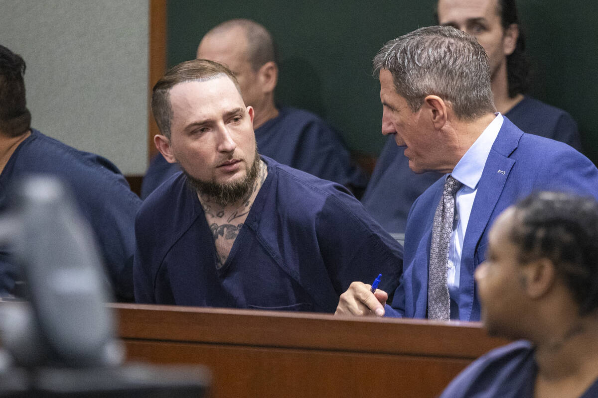 Attorney Thomas Ericsson, right, representing Miles Stano Jr., left, talk in court during a hea ...