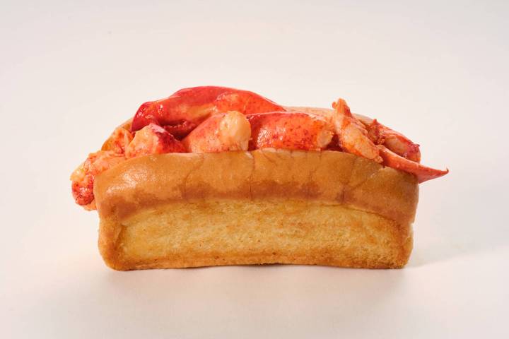 A warm Maine lobster roll from Angie's Lobster, a small restaurant group known for its affordab ...