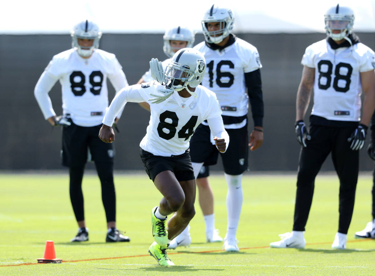 Oakland Raiders wide receiver Antonio Brown (84) runs a route as Keelan Doss (89), Tyrell Willi ...
