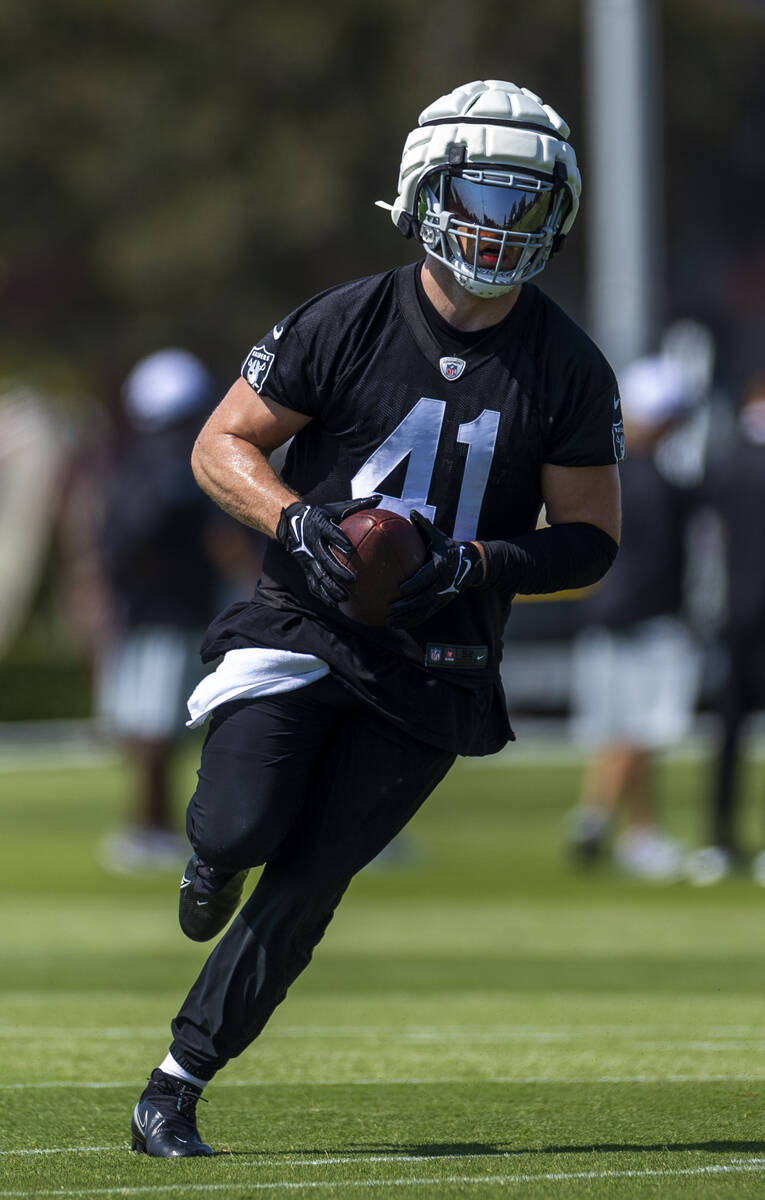 Raiders linebacker Robert Spillane (41) catches a pass during the second day of Raiders trainin ...