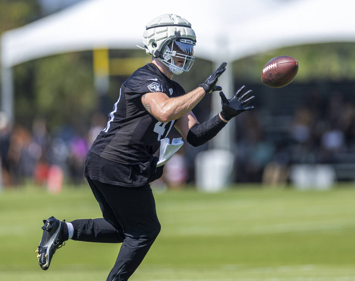 Raiders linebacker Robert Spillane (41) catches a pass during the second day of Raiders trainin ...