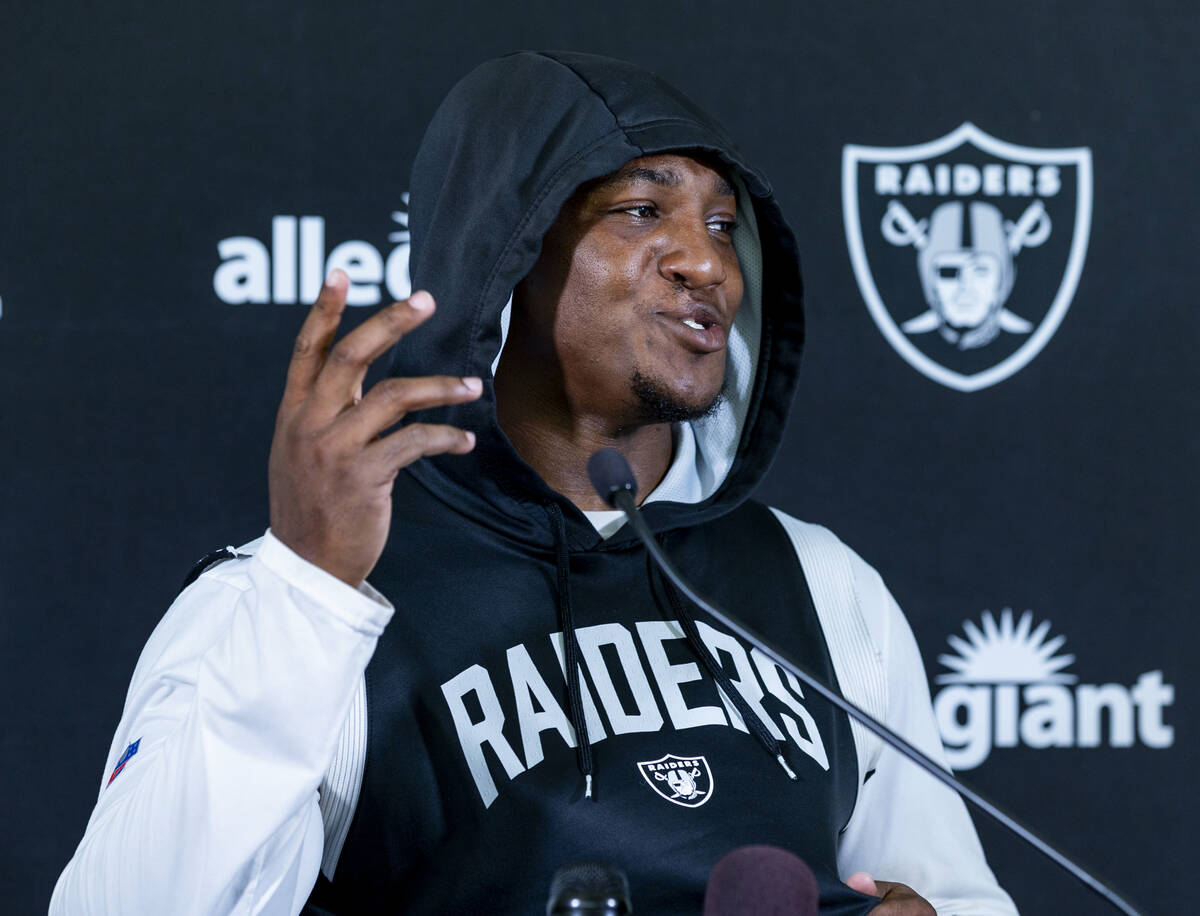 Raiders running back Zamir White (3) answers questions during a media interview on the second d ...