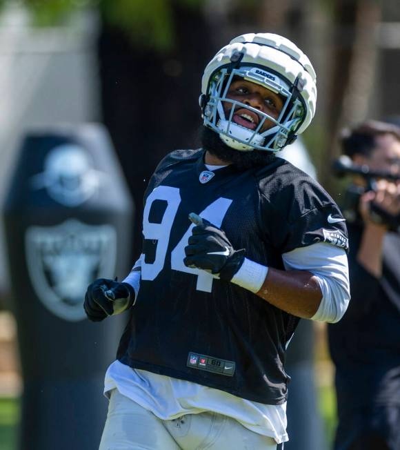 Raiders defensive tackle Christian Wilkins (94) runs on a drill during the second day of Raider ...