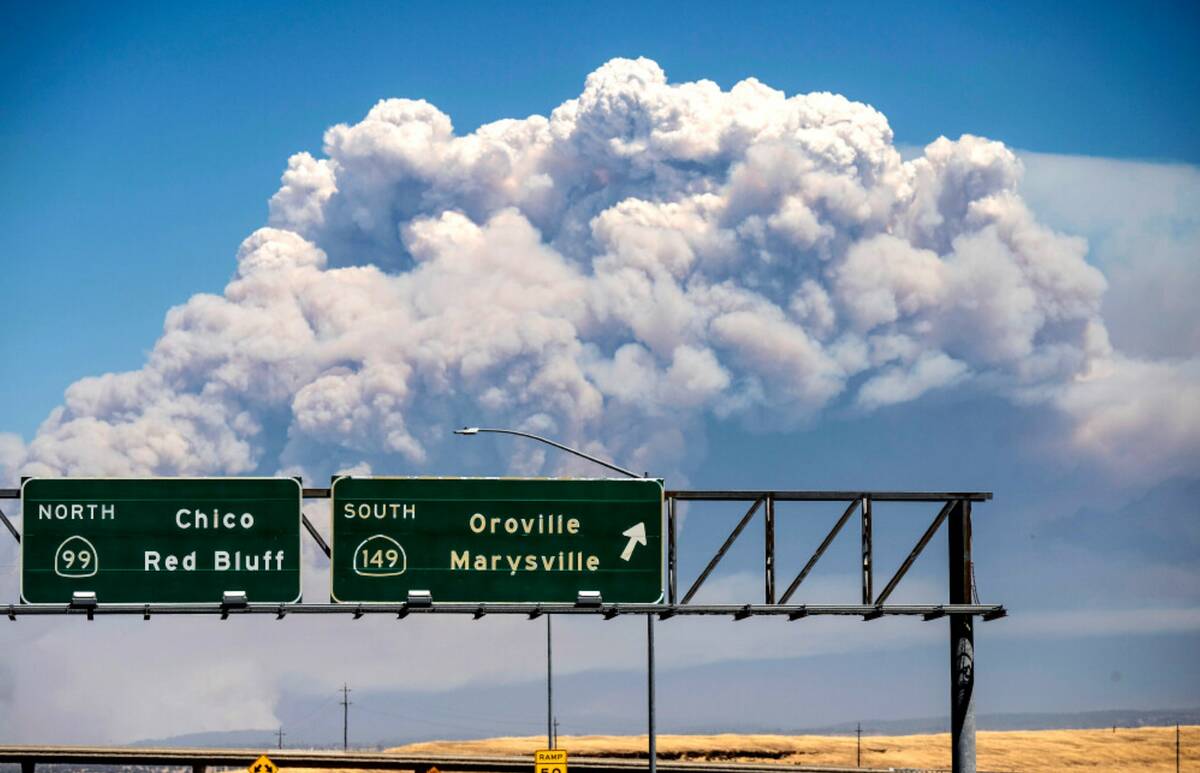 A plume rises from the Park Fire burning near Chico, Calif., on Thursday, July 25, 2024. (AP Ph ...
