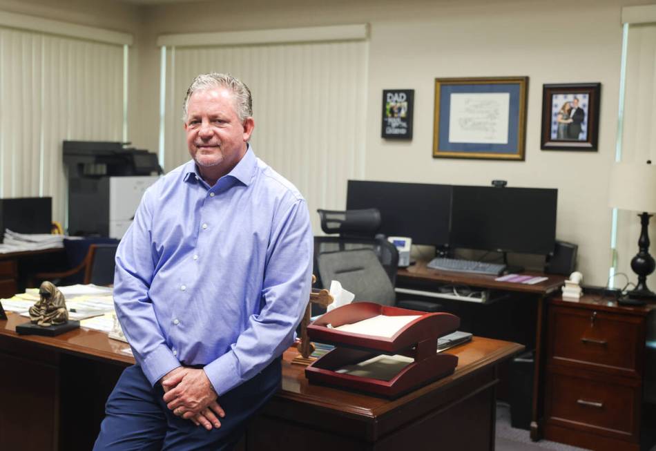 Deacon Tom Roberts, CEO and president, poses for a portrait in his office at Catholic Charities ...