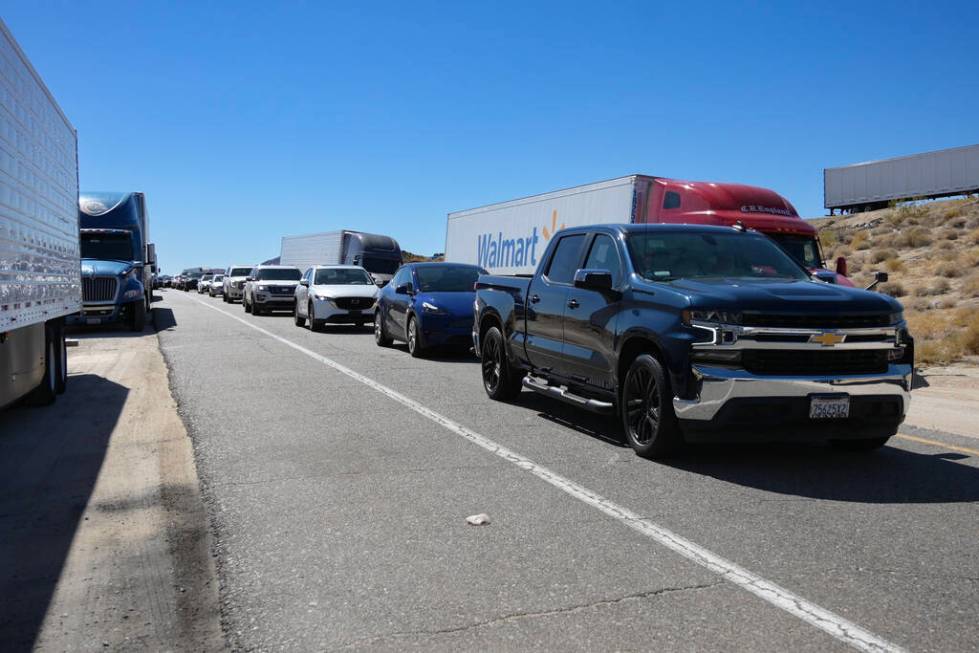Traffic is seen backed up on the Kelbaker Road exit on eastbound I-40 in California Saturday, J ...