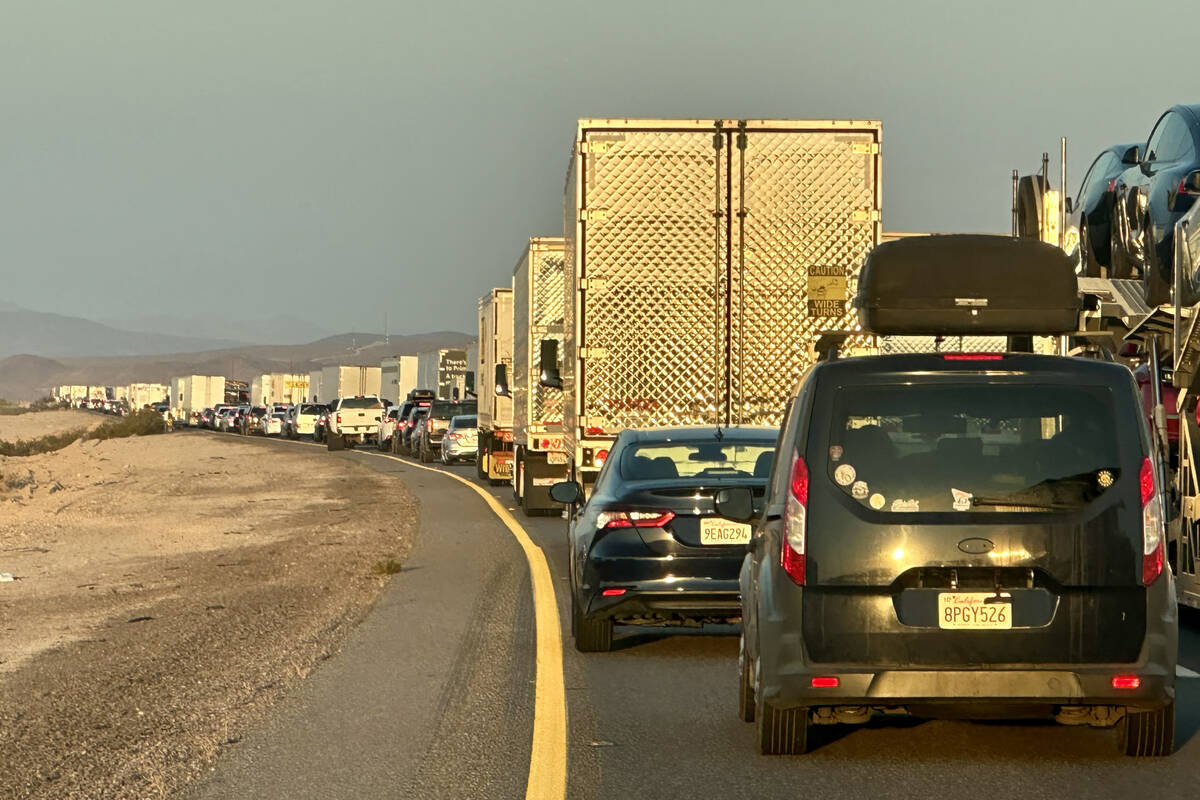 Cars and trucks backed up for 30 miles west of Ludlow, California, headed east on the I-40 on F ...