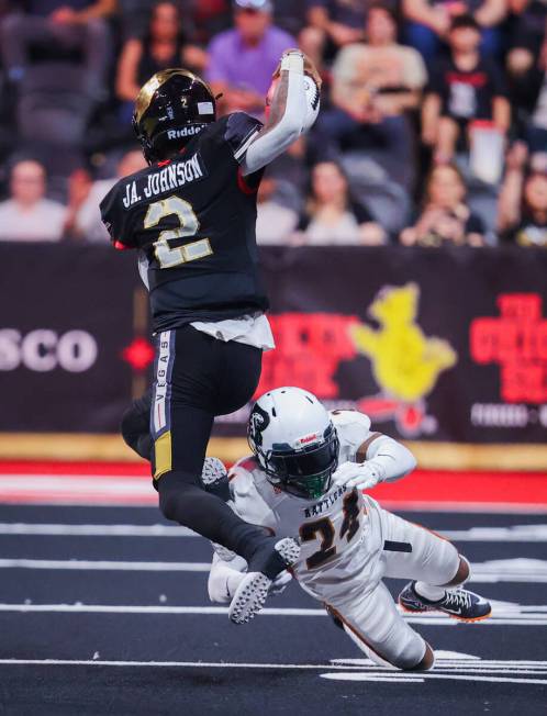 Arizona Rattlers defensive back Omari Alexander (24) goes in to tackle Knight Hawks quarterback ...