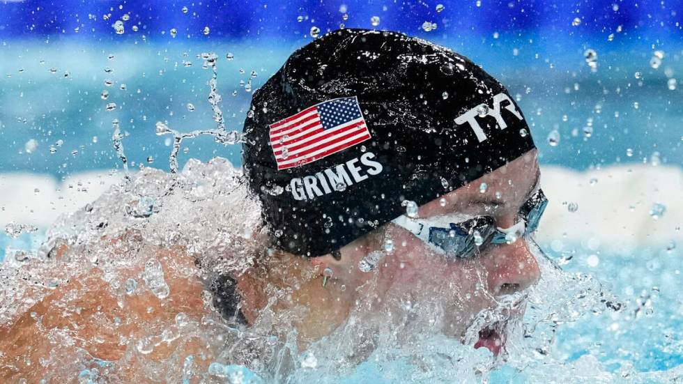 Katie Grimes, of the United States, competes in the women's 400-meter individual medley final a ...