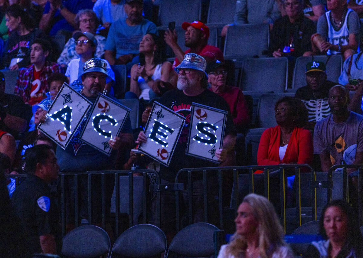 Aces fans display lighted letters as the team readies to face the Phoenix Mercury during the fi ...