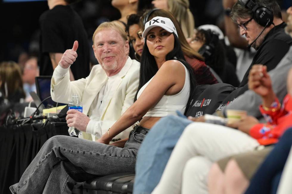 Las Vegas Aces owner Mark Davis gives a thumbs up to a friend during the second half of the Ace ...