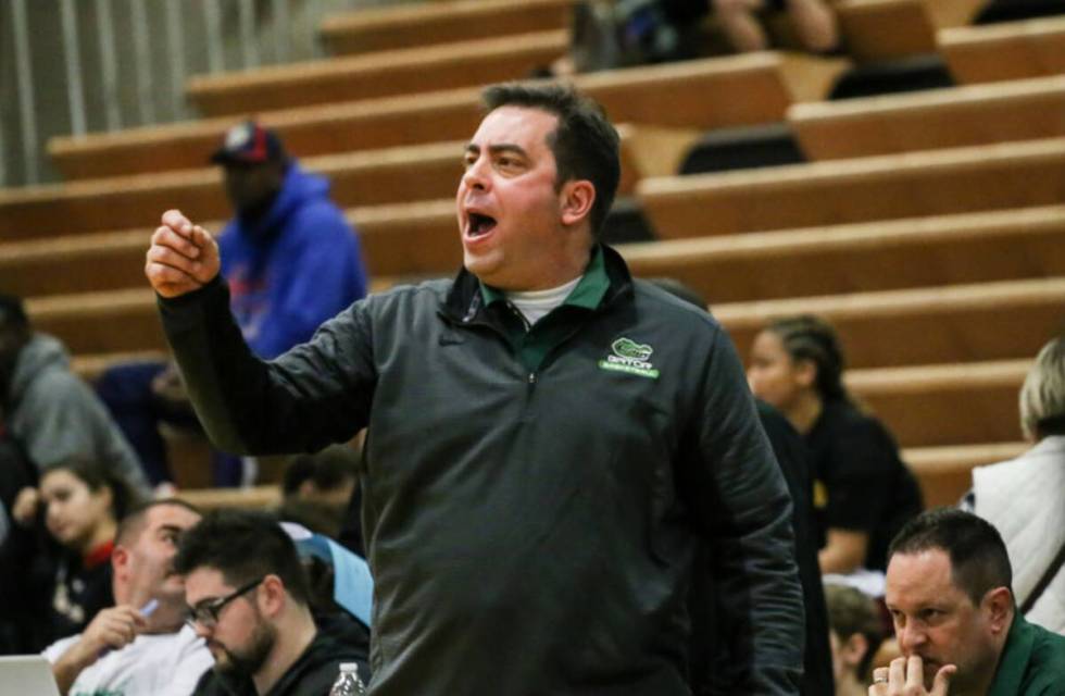 Green Valley basketball coach Eric Johnston reacts during a game against Beverly Hills at Green ...