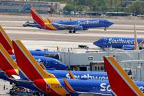 A Southwest Airlines jet takes off at Harry Reid International Airport on Thursday, July 25, 20 ...