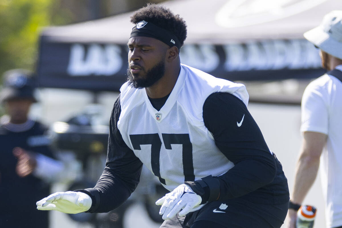 Raiders offensive tackle Thayer Munford Jr. (77) begins to warm up during the second day of Rai ...