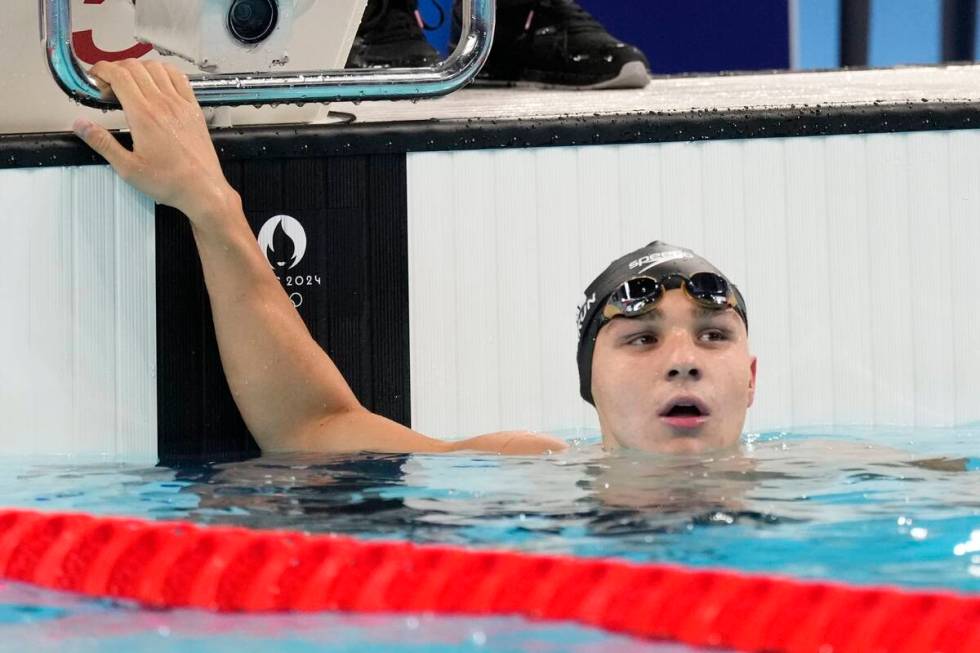 Ilya Kharun, of Canada, competes during a heat in the men's 200-meter butterfly at the 2024 Sum ...