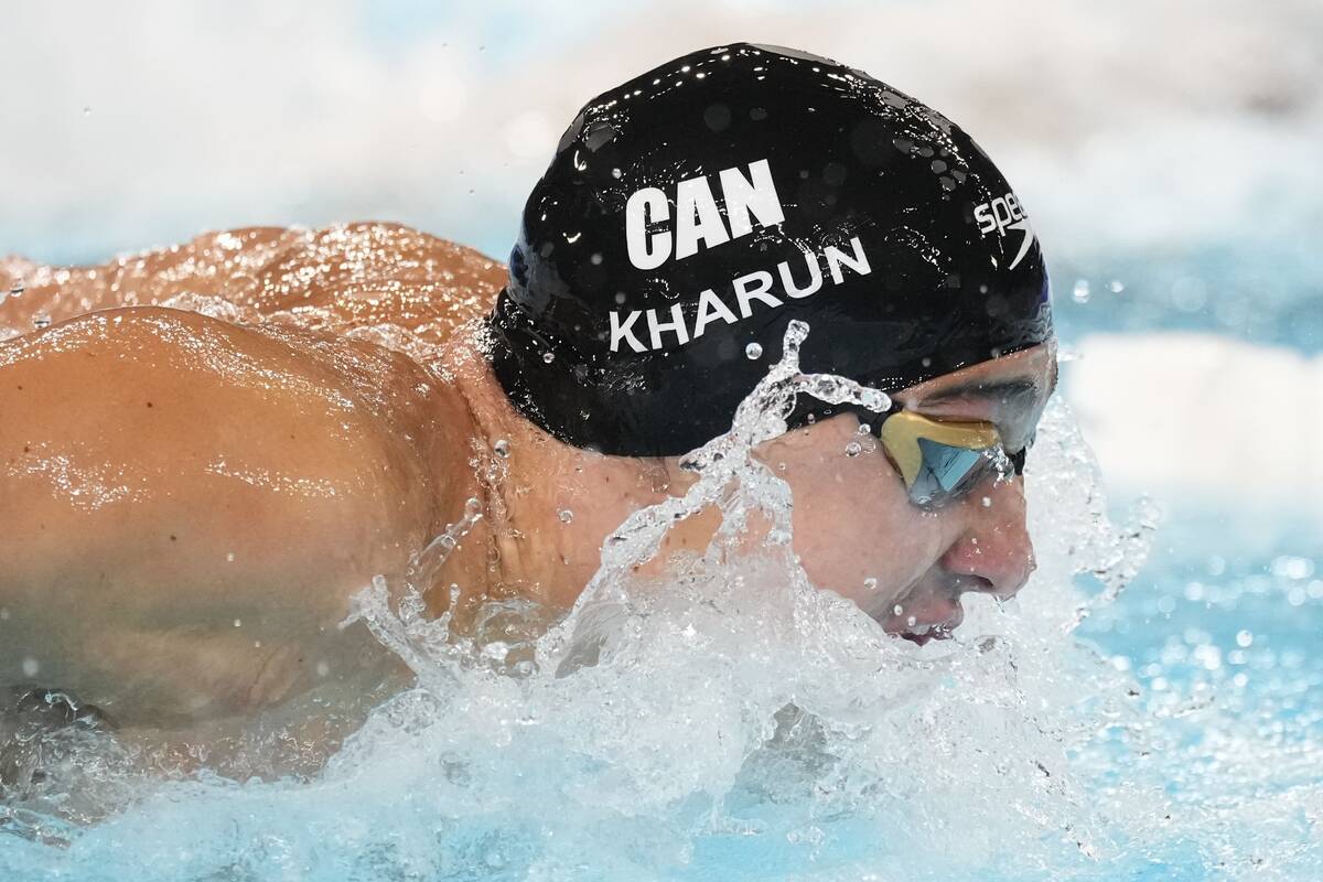 Ilya Kharun, of Canada, competes during a heat in the men's 200-meter butterfly at the 2024 Sum ...