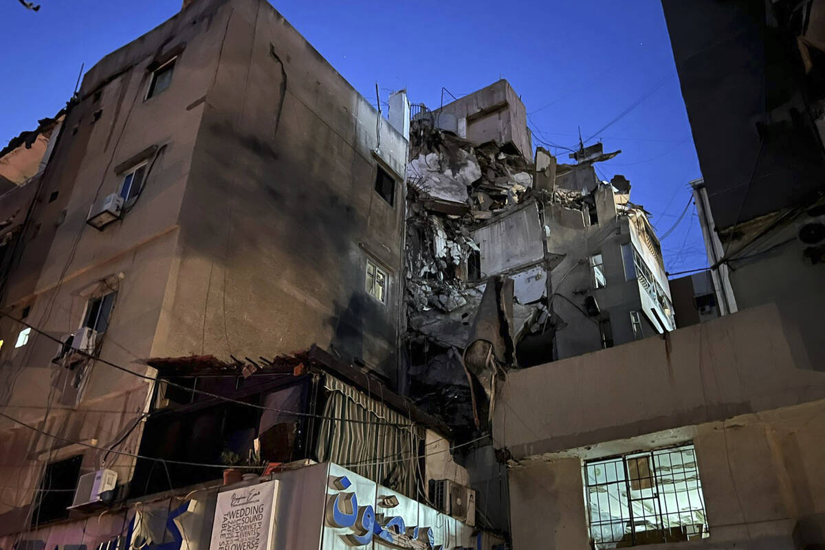 A general view shows a damaged building that was hit by an Israeli airstrike in the southern su ...