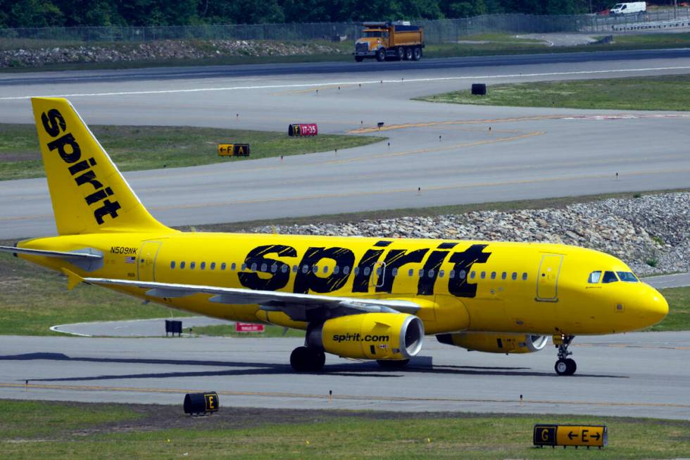 A Spirit Airlines 319 Airbus taxis at Manchester Boston Regional Airport, Friday, June 2, 2023, ...