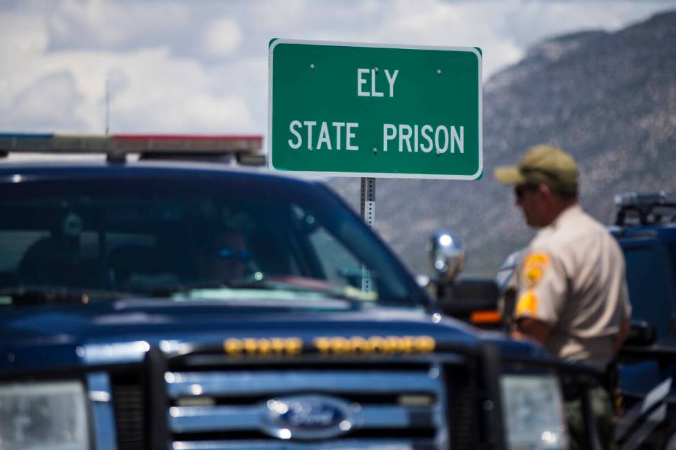 Law enforcement officials guard the entrance to Ely State Prison in Ely on Wednesday, July 11, ...