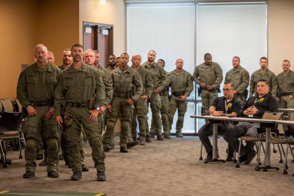 Metropolitan Police Department SWAT officers wait to receive the Community Service award during ...