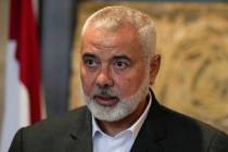 FILE - Ismail Haniyeh, leader of the Palestinian militant group Hamas, speaks to journalists af ...