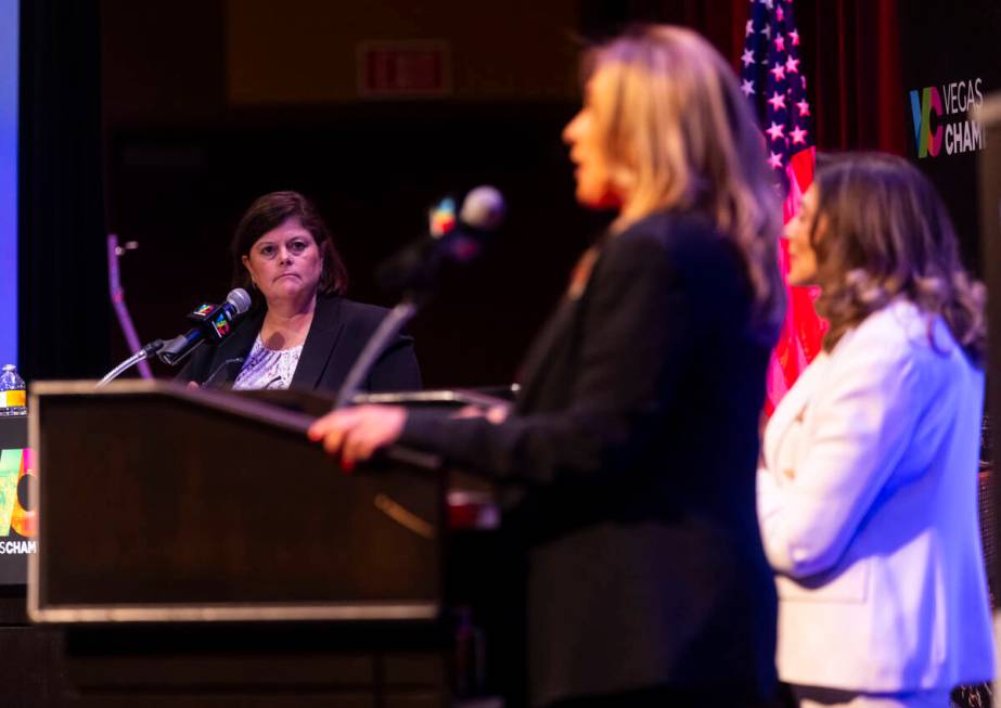 Debate moderator Betsy Fretwell, former manager of the City of Las Vegas, listens to mayoral ca ...