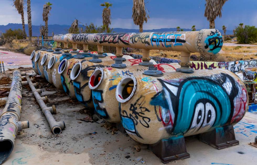 Tanks are covered in graffiti at the former Rock-A-Hoola Water Park on Tuesday, July 23, 2024, ...