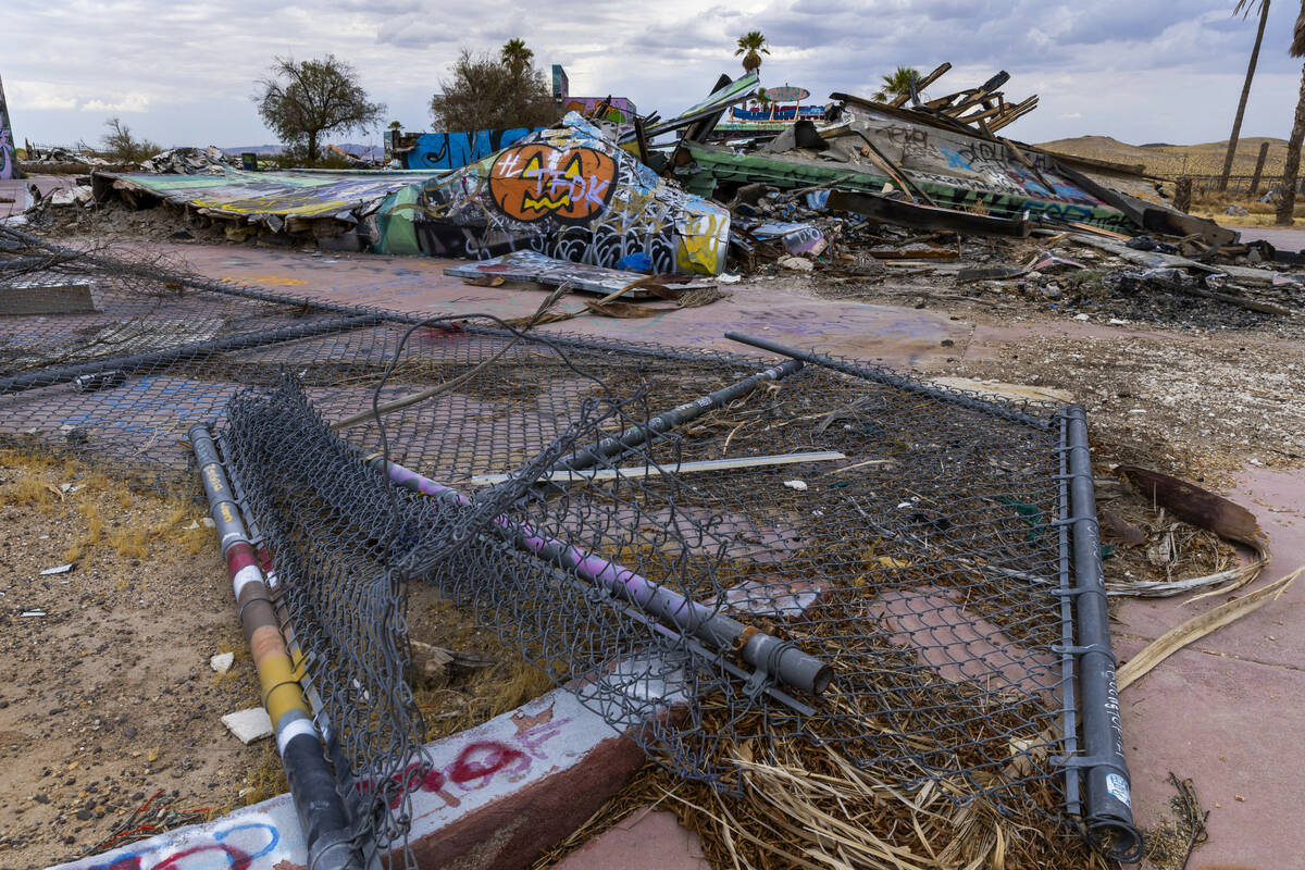 Buildings and fencing are heavily damaged and covered in graffiti the former Rock-A-Hoola Water ...