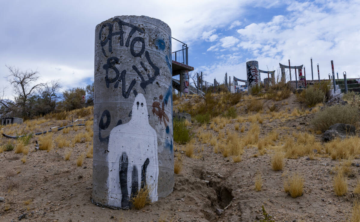 A water slide hill is dismantled and covered in graffiti at the former Rock-A-Hoola Water Park ...