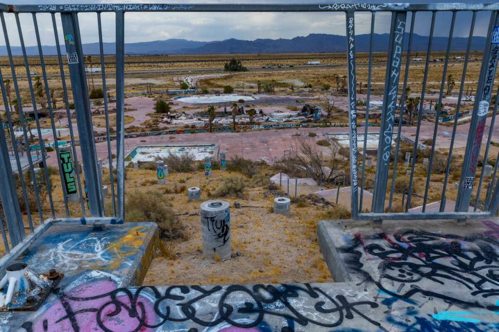 A water slide hill is dismantled and covered in graffiti at the former Rock-A-Hoola Water Park ...