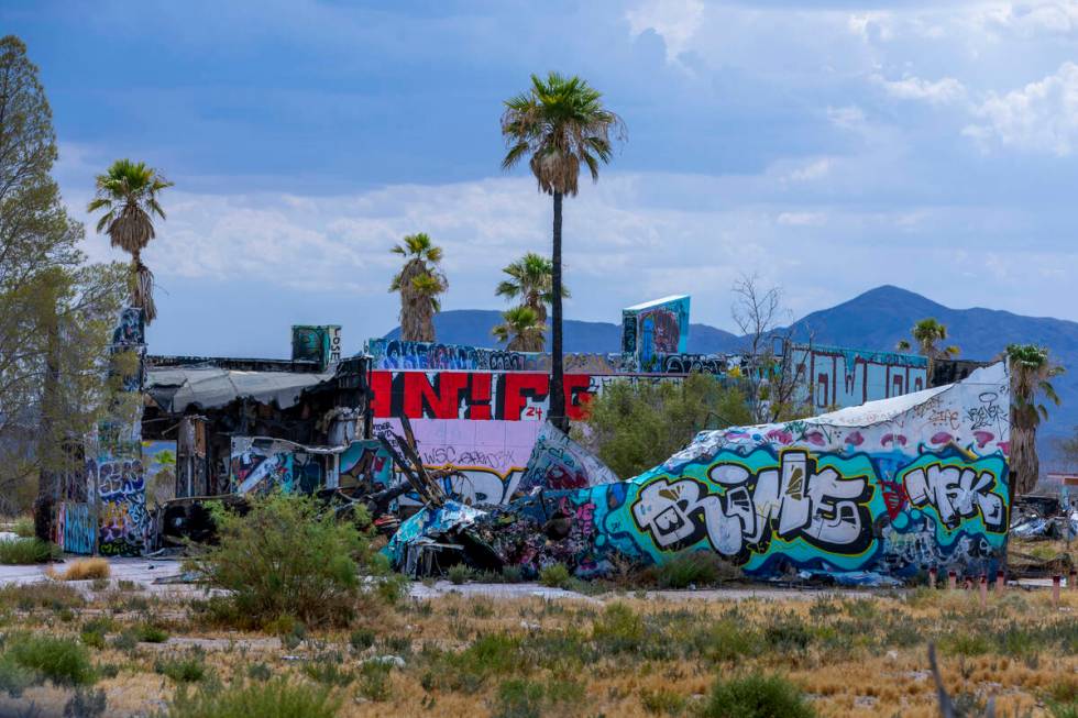 Graffiti covers most of the remaining structures at the former Rock-A-Hula Water Park on Tuesda ...