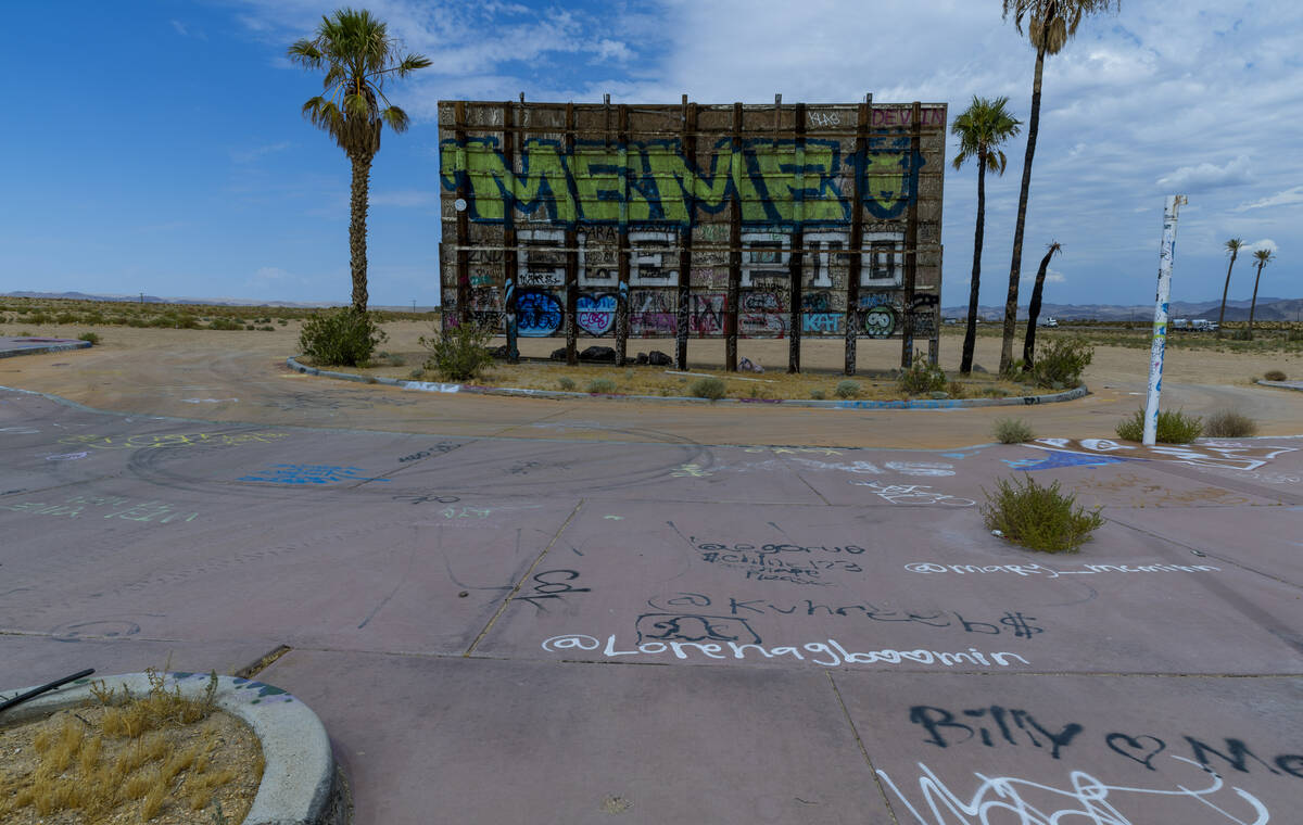 Exterior signage is covered in graffiti at the former Rock-A-Hoola Water Park on Tuesday, July ...