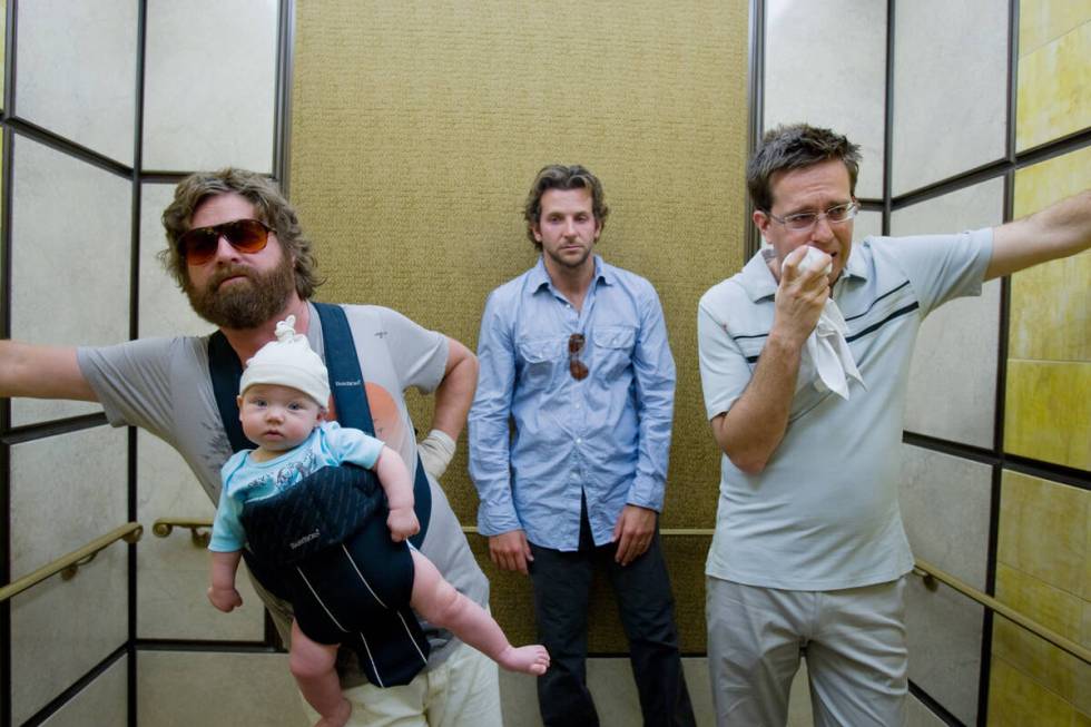 ZACH GALIFIANAKIS as Alan, Baby Tyler, BRADLEY COOPER as Phil and ED HELMS as Stu in Warner Bro ...